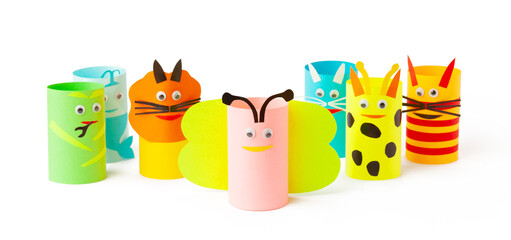 Multicolored paper craft on a white background. Children's creativity.