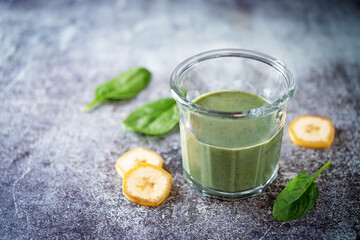 Spinach banana smoothie in a glass