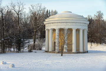 Evening in the winter park. Pavlovsk, the vicinity of St. Petersburg. Russia