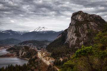 Beautiful View of Chief Mountain, Sea to Sky Highway and Howe Sound. Cloudy Overcast Sky. Dark Art Render. Located in Squamish, North of Vancouver, British Columbia, Canada.