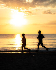 parent and child on beach
