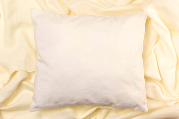 White pillow mockup on soft fabric background