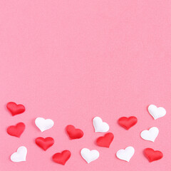 White heart and a red heart on a pink background. Concept for love day, Valentine's day, February 14th. Copy space. Valentine's Day card.