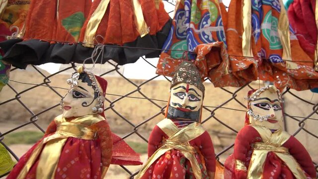 Rajasthani puppets hanging in the street market - also known as Katputli