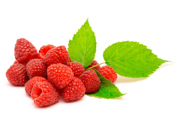 Ripe red raspberry berries and green leaves on a white background