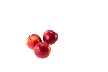 A few appetizing red apples on a white background, natural homemade apples