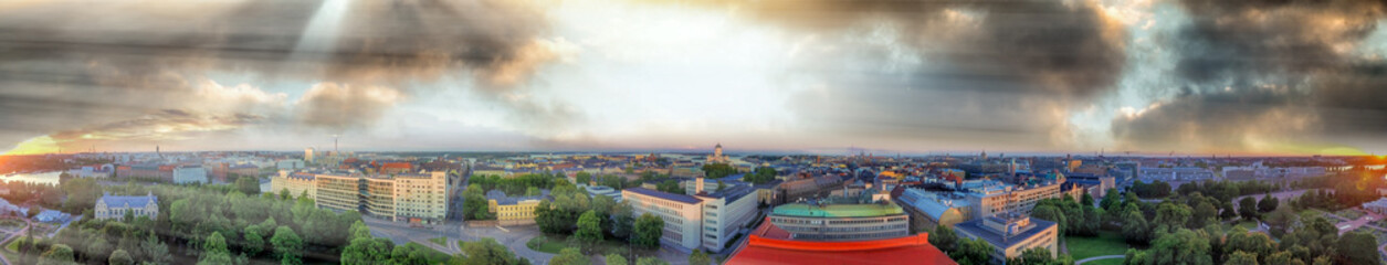Panoramic sunset aerial view of Helsinki skyline from Uspenski Cathedral, Finland