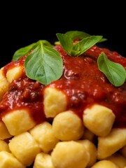 Gnocchi di patata, italian potato noodle with tomato sauce and basil