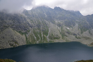 Mountain lake Velke Hincovo pleso under peak Mengusovsky stit in Mengusovska valley in the national park of High Tatras - Slovakia