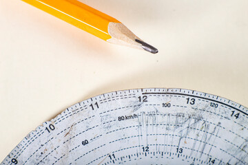 Tachograph chart and pencil for recording the time and mileage of a truck. Route, driver and...