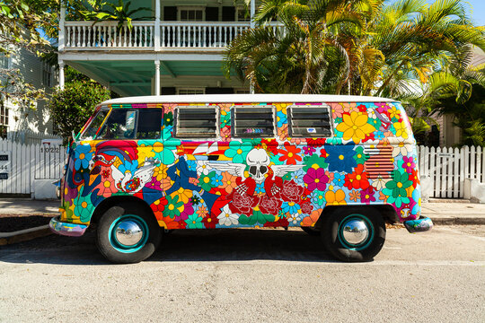 Classic Volkswagen bus parked in the historic residential district of Key West, Florida