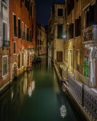 Scenic night view of a typical Venetian canal, Venice, Italy