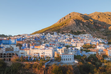 A scenic sunset or sunrise cityscape view over Chefchaouen, Morocco, known as the Blue Pearl with...