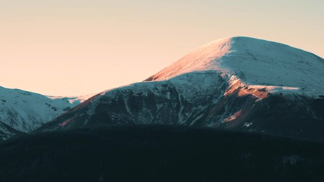 Landscape of Hoverla mountain, the highest peak in ukrainian Carpathian mountains surrounded pine dense forest.