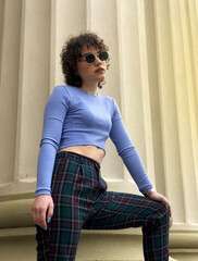 YOUNG GIRL WITH SUNGLASSES