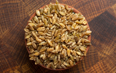 Freekeh Grain on a Dark Wooden Butcher Block