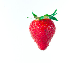 A single strawberry isolated on white BGD.