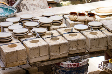Clay injection molding technique in a traditional ceramics factory at the small city of Raquira in Colombia