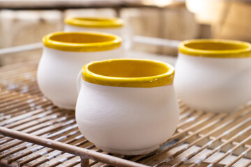 Clay injection molding technique in a traditional ceramics factory at the small city of Raquira in Colombia