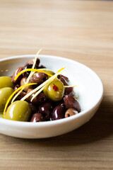 Green and Black Olives, marinated olives, Mediterranean food, snack, tapas, a bowl of olives