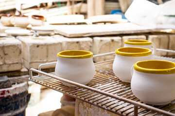 Clay injection molding technique in a traditional ceramics factory at the small city of Raquira in Colombia