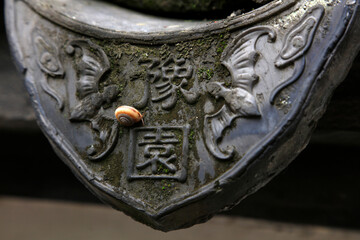 Old grey tiles on eaves Yu Garden, Shanghai, China