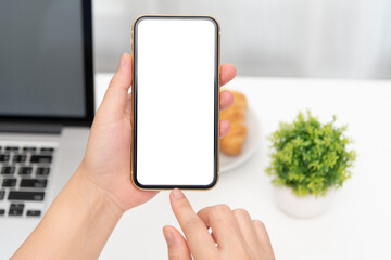 female hands holding phone with isolated screen in the coffee shop
