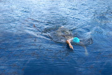 child jumping in water