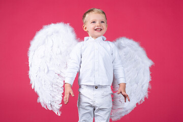 Little boy child dressed like an angel.