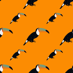 Black toucan bird exotic seamless animal pattern in doodle style. Orange bright background. Animal print.