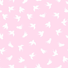 Seamless pattern with white swallow silhouette on pink background. Cute bird in flight. Vector illustration. Doodle style. Design for invitation, poster, card, fabric, textile.