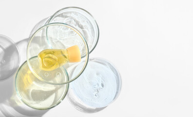 yellow serum on a laboratory dishes. medical treatment for dry skin. face care vitamin liquid. dermatology beauty concept. professional skin care. Research Bio Science. 