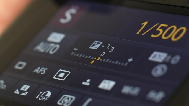 Changing the settings on a digital camera LCD display screen