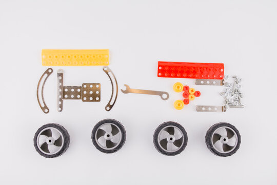 children's iron constructor with nuts and screws on a white background