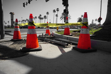 Safety cones and caution tape around work work being done