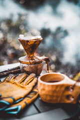 Ready to dropping water on the ground coffee. coffee break with drip coffee on the forest, ground...