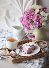 cup of tea and flowers