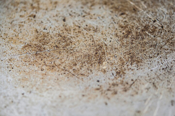 scratched bottom of an old iron pot, brutal metal background