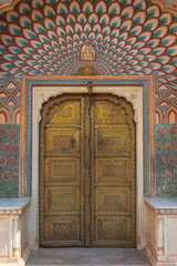Lotus gate of City Palace with flower pattern, it represents summer and Lord Shiva. Jaipur, Rajasthan, India.