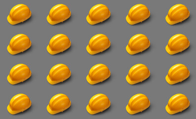 Builder's hardhats on grey background