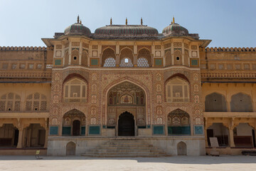 Fototapeta na wymiar Main entrance gate of Sheesh Mahal or mirror. Amber palace, Jaipur, Rajasthan, India.