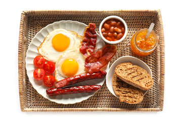 Traditional English breakfast with fried eggs in tray on white background