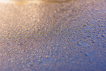 Water drop stain on car with natural background