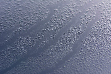 Water drop stain on car with natural background