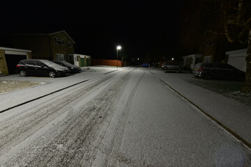 A frozen unsafe icy road in Horley in the UK in February 2021