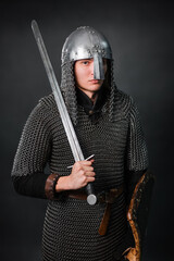 Portrait of a medieval warrior of the late Viking era and the beginning of the Crusades. Knight in...