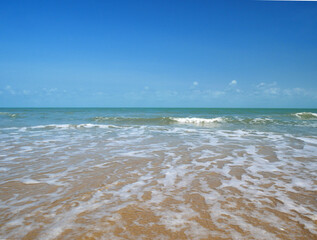 Beautiful tropical sea and sand beach with blue sky in sunny day