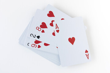 Playing cards isolated on white and gray background for poker casino game.