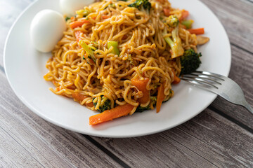 Spicy Thai Noodles served with boiled eggs