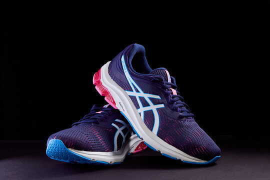Zhlobin, Belarus - January 10, 2021: ASICS GEL PULSE Running Shoes. ASICS is a Japanese athletic equipment company which produces cushioning footwear.